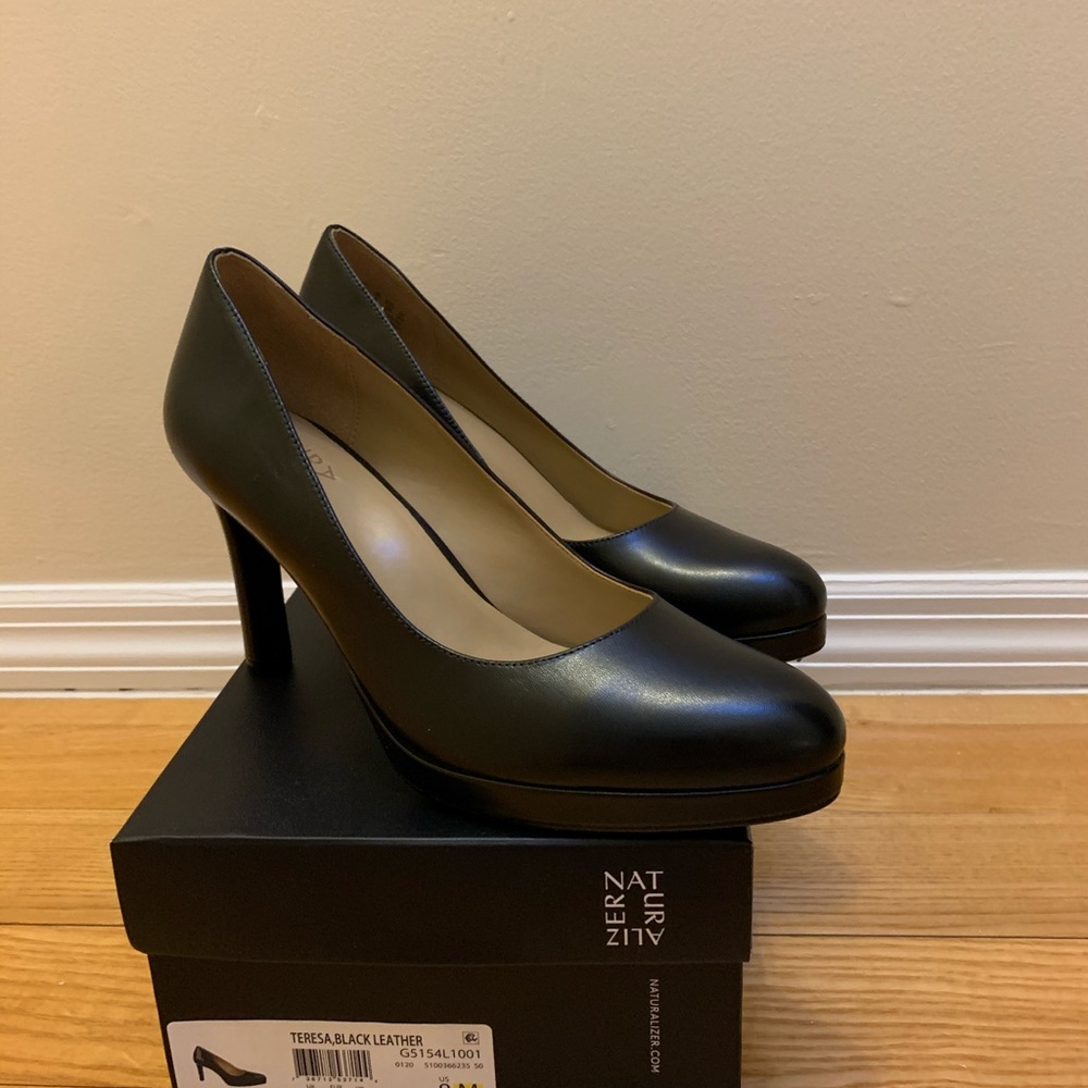 Naturalized Black heels